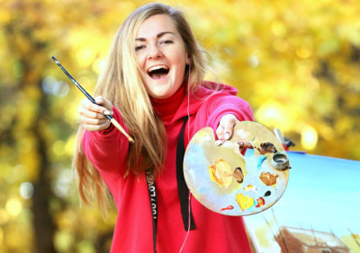 Woman holding artist palette